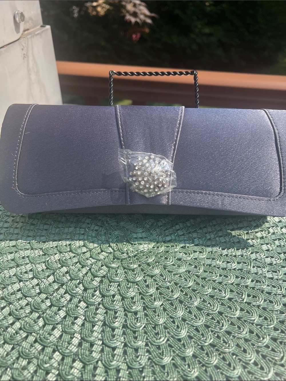 NWOT Gray Evening Clutch with clear crystal embellishment.